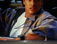 Keanu Reeves autographed 11x14 Beckett COA