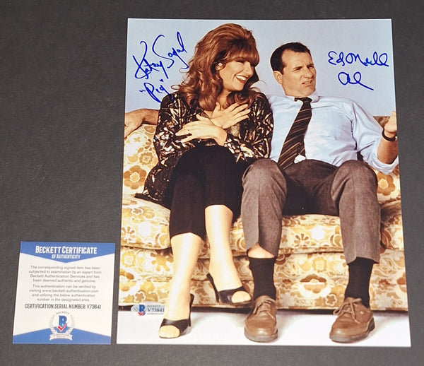 Ed O'Neill and Katey Sagal autographed 8x10 Beckett COA