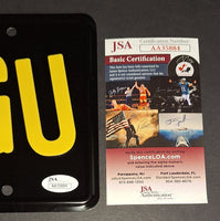 Jonathan Breck autographed license plate JSA COA
