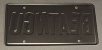 Jonathan Breck autographed license plate JSA COA