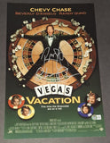 Chevy Chase and Randy Quaid autographed 11x17 Beckett COA