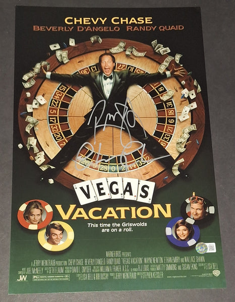 Chevy Chase and Randy Quaid autographed 11x17 Beckett COA