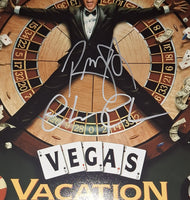 Chevy Chase and Randy Quaid autographed 11x17 Beckett COA