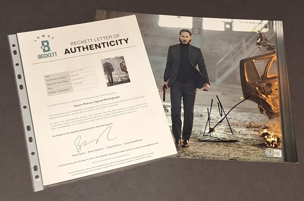 Keanu Reeves autographed 11x14 Beckett COA