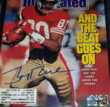 Jerry Rice autographed Sports Illustrated Rice hologram