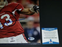Kurt Warner autographed 11x14 Beckett COA